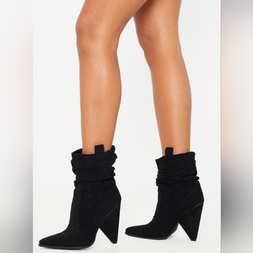 Black slouch cone heel ankle boots.